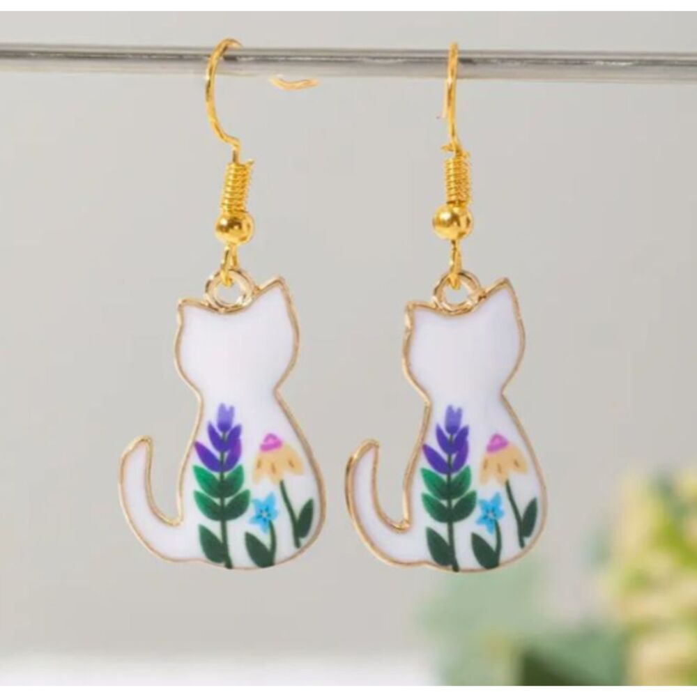 White Enamel Cats with Delicate Flowers Painted on - lovely!